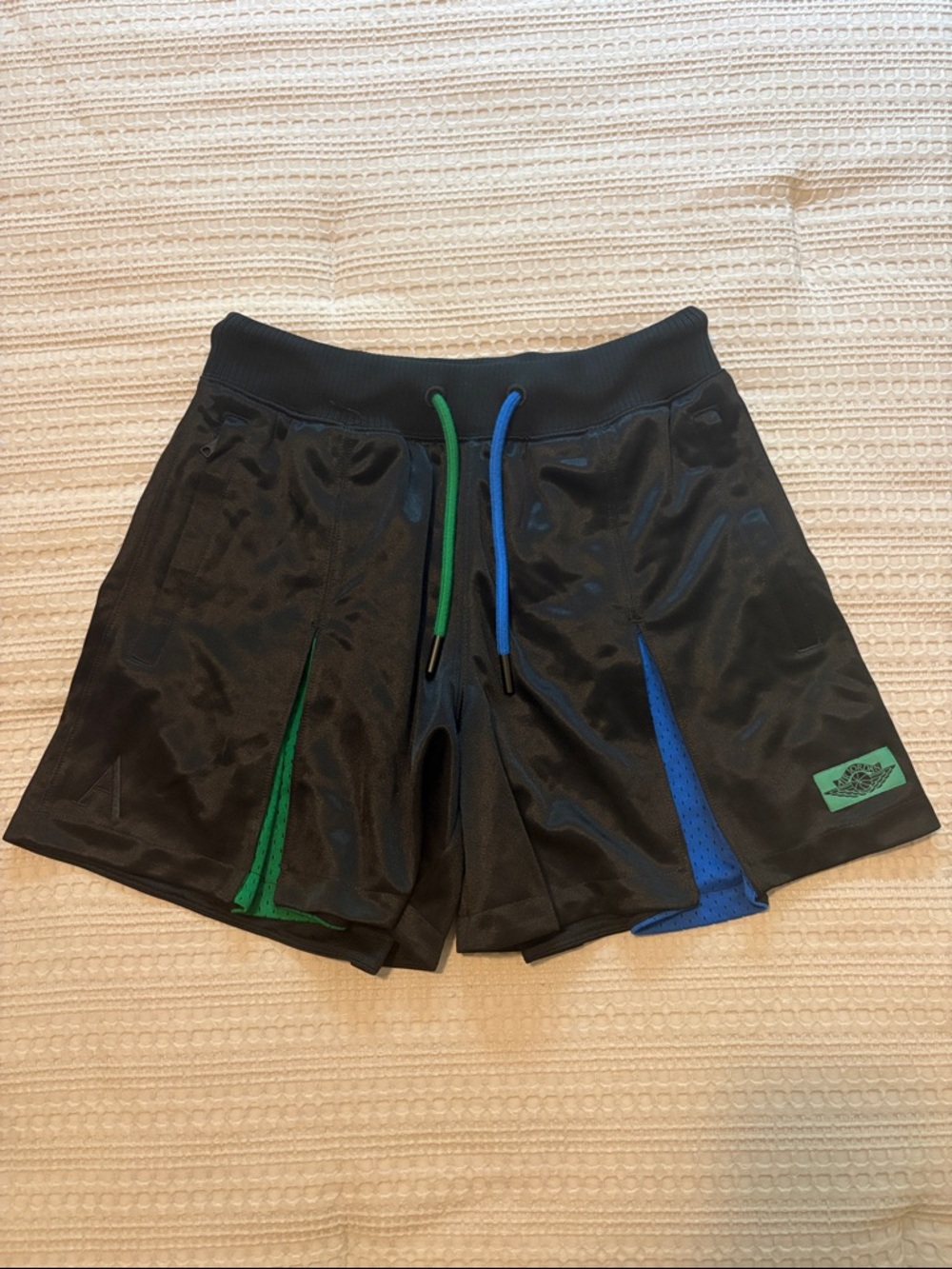 Air Jordan X Aleali May Women's Black Pleated Shorts with Blue & Green Accents